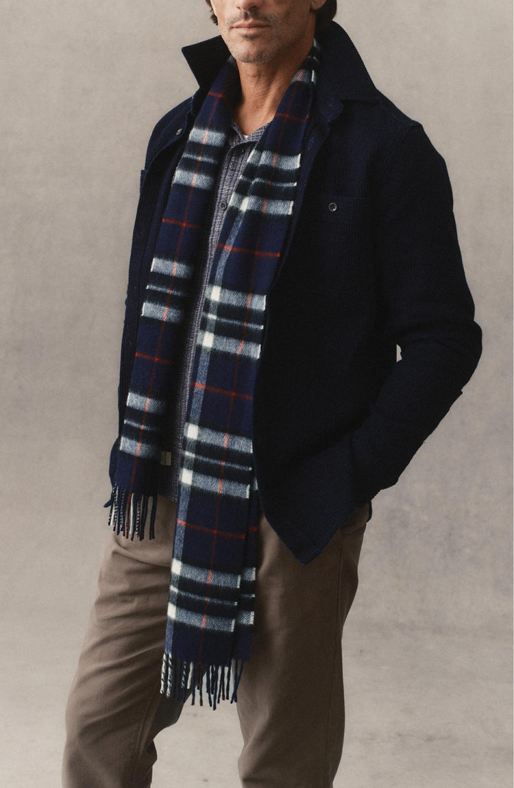 fit model posing in The Fireside Scarf in Eddy Plaid