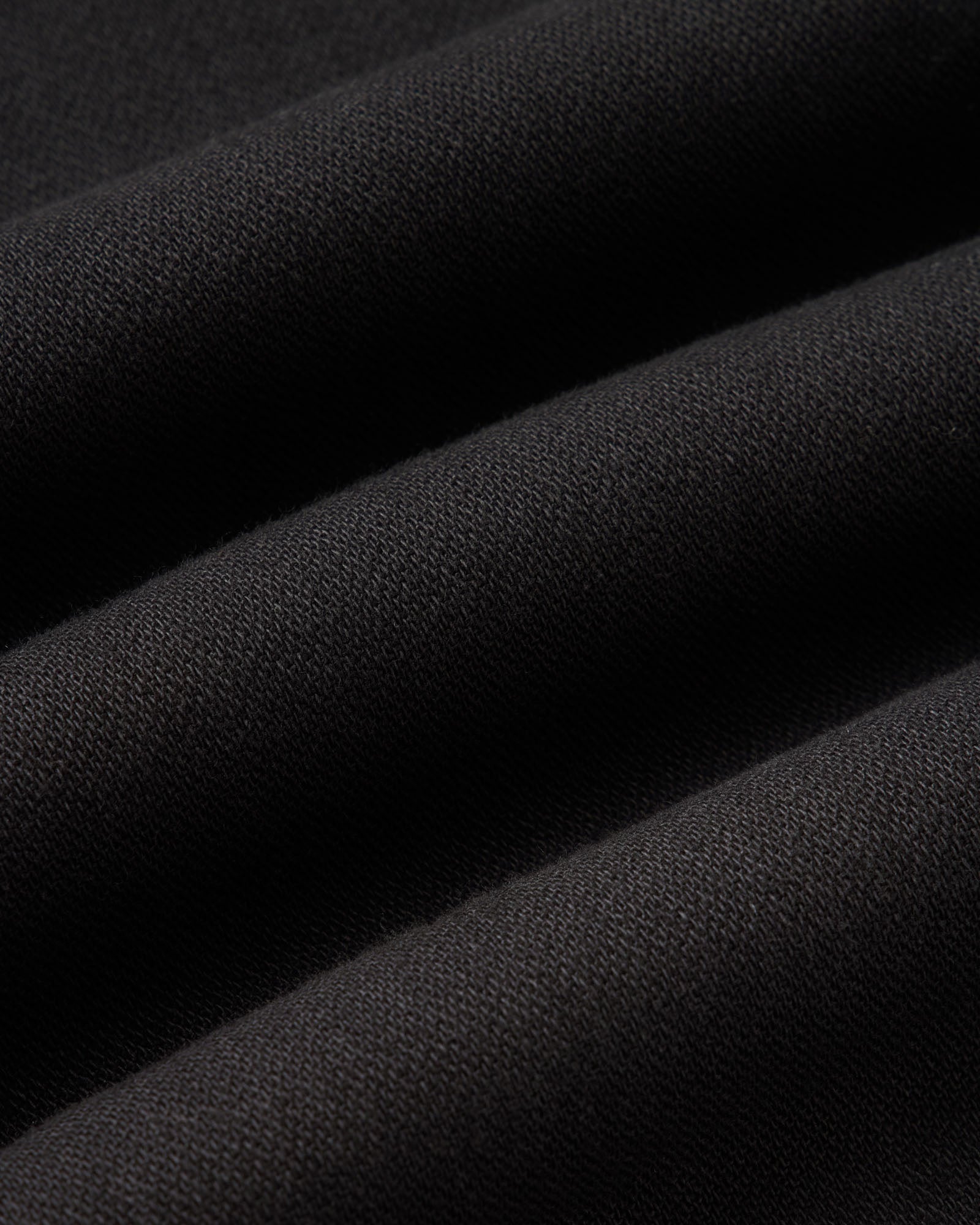 material shot of the fabric on The Forest Cargo Pant in Coal Broken Twill, Bottoms by Taylor Stitch