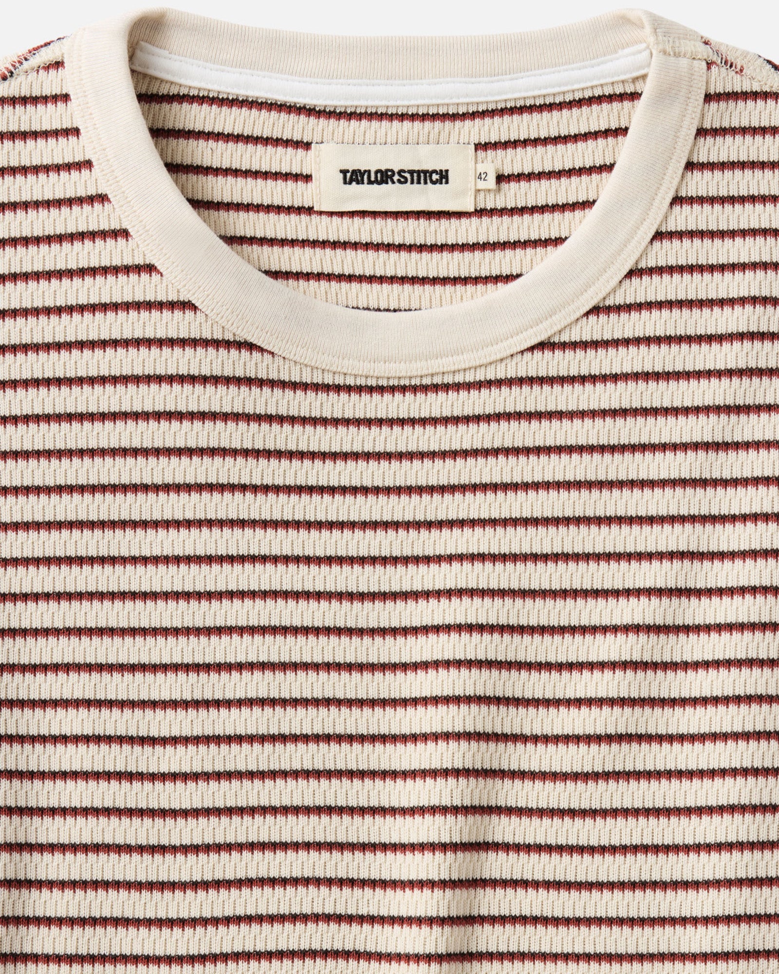 material shot of the collar on The Organic Cotton Crew in Vintage White Stripe Waffle, Knits by Taylor Stitch