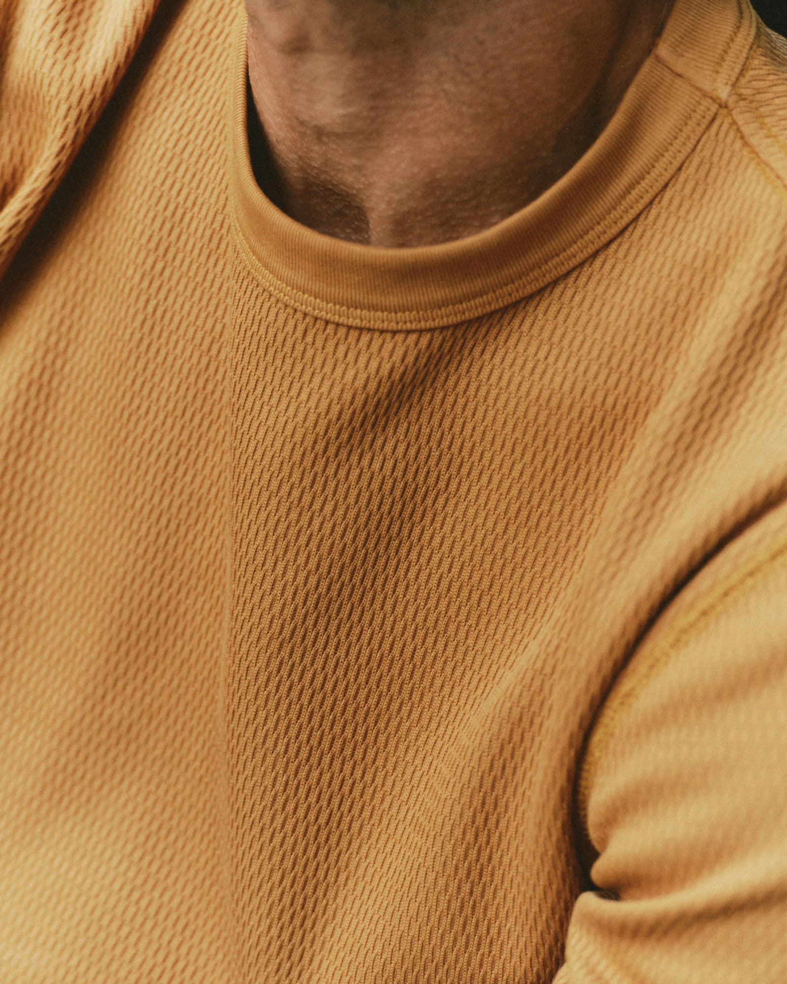 fit model showing off the collar on The Organic Cotton Short Sleeve Crew in Saffron Waffle, Knits by Taylor Stitch