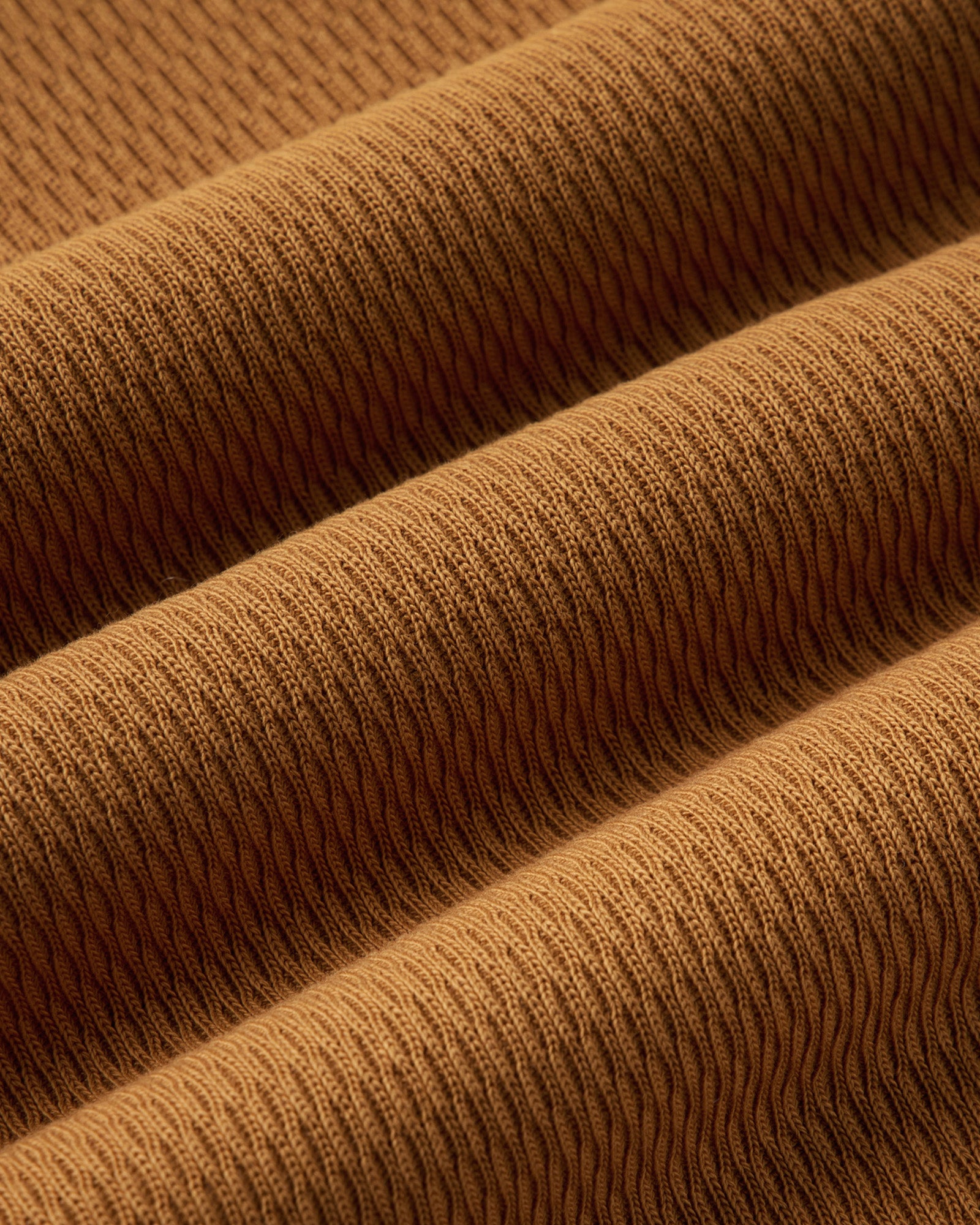 material shot of the fabric on The Organic Cotton Short Sleeve Crew in Saffron Waffle, Knits by Taylor Stitch