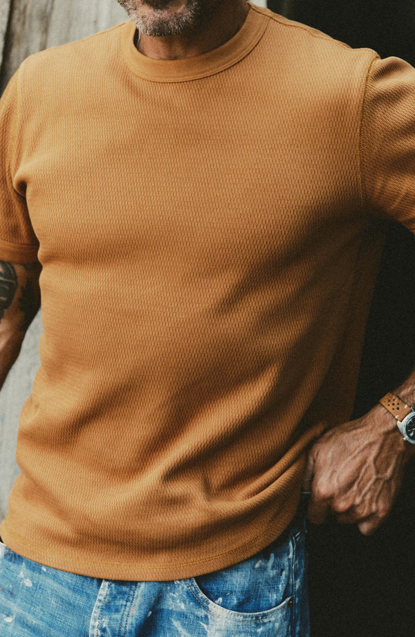 fit model showing off The Organic Cotton Short Sleeve Crew in Saffron Waffle