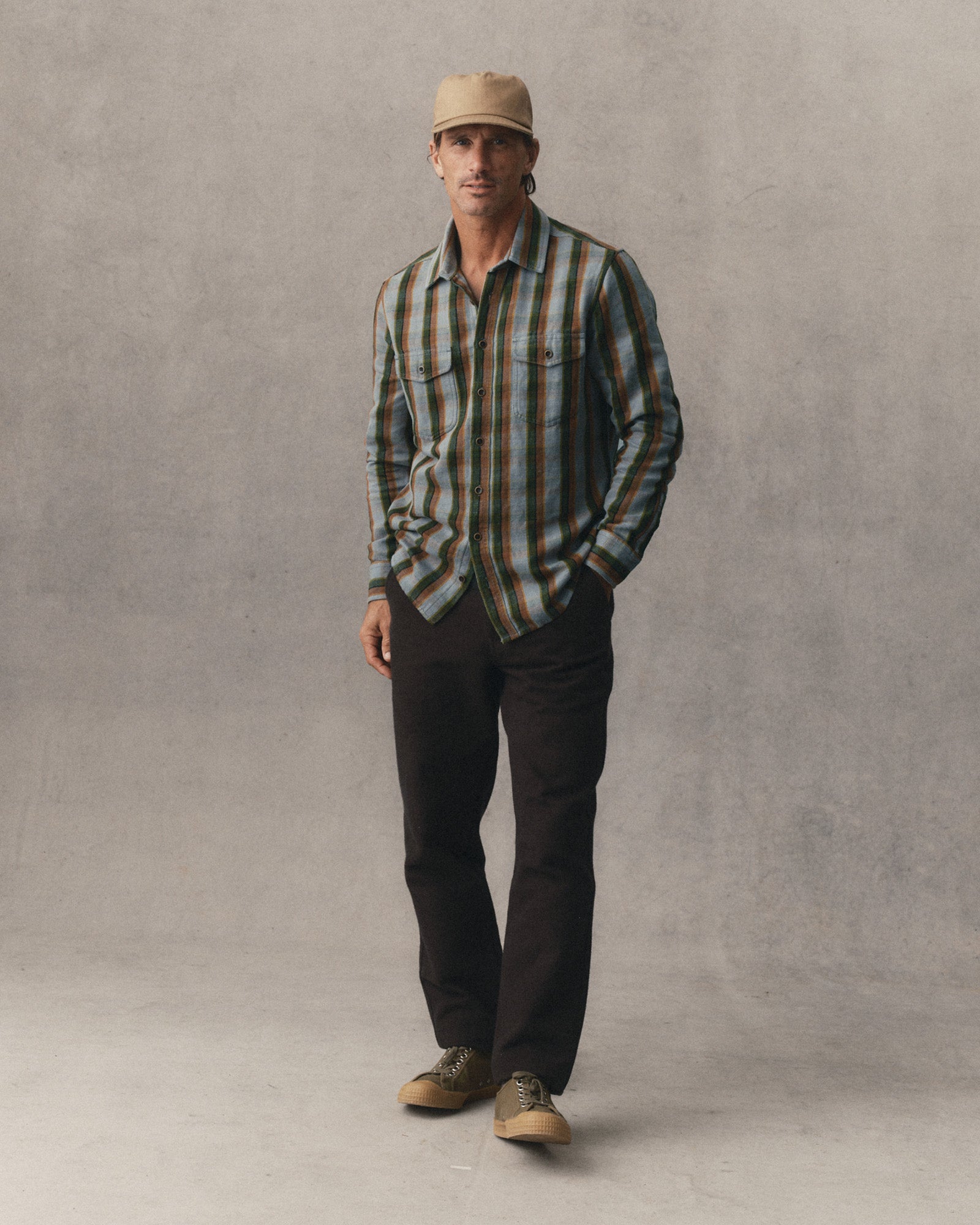 fit model posing in The Redding Shirt in Drizzle Check Hemp, Wovens by Taylor Stitch