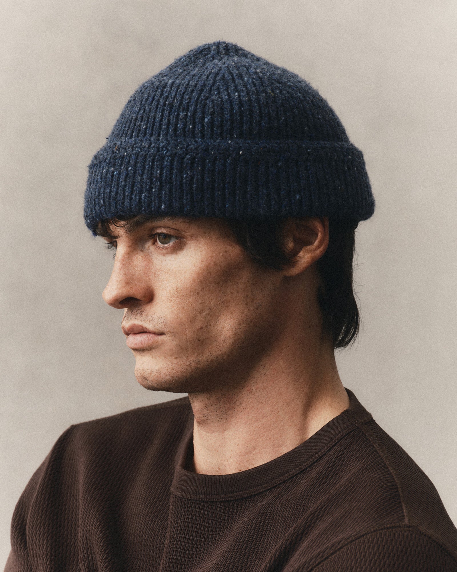 fit model showing off The Seafarer Beanie in Atlantic Blue Donegal, Accessories by Taylor Stitch