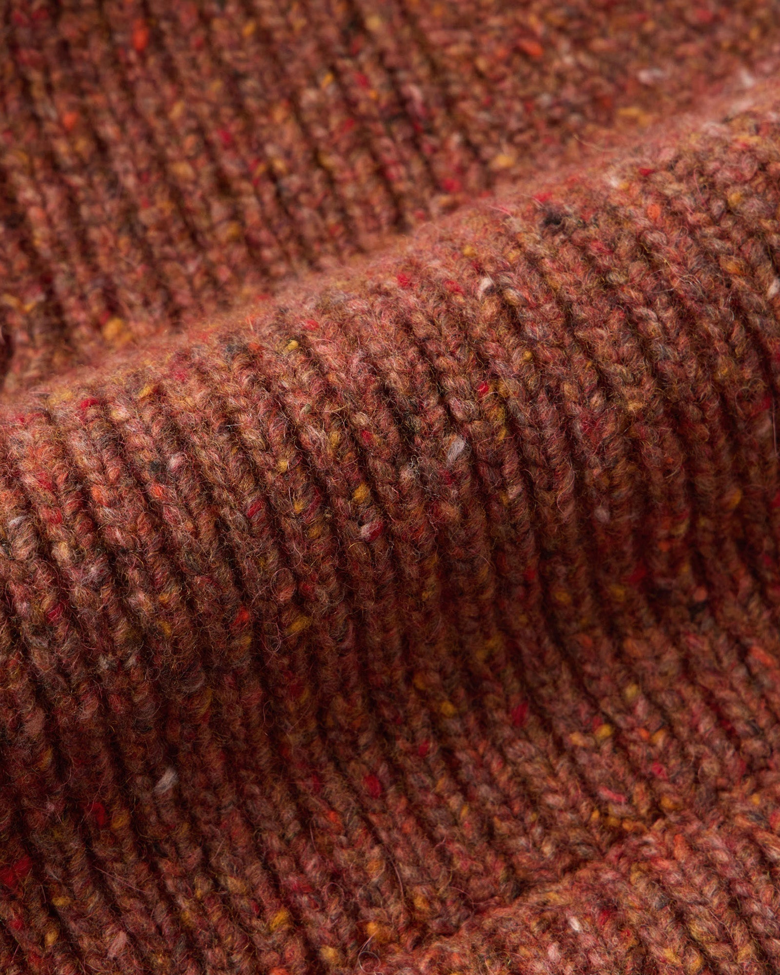 material shot of the fabric on The Seafarer Beanie in Ember Donegal, Accessories by Taylor Stitch