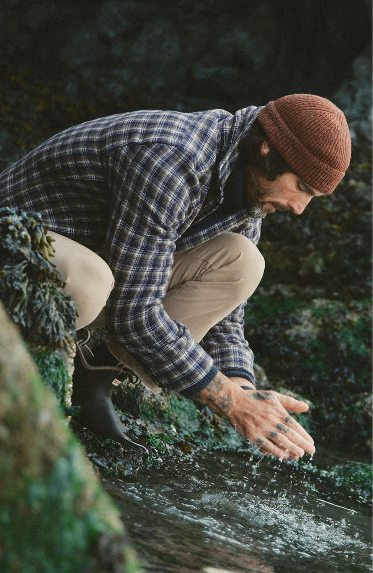 fit model posing in The Seafarer Beanie in Ember Donegal
