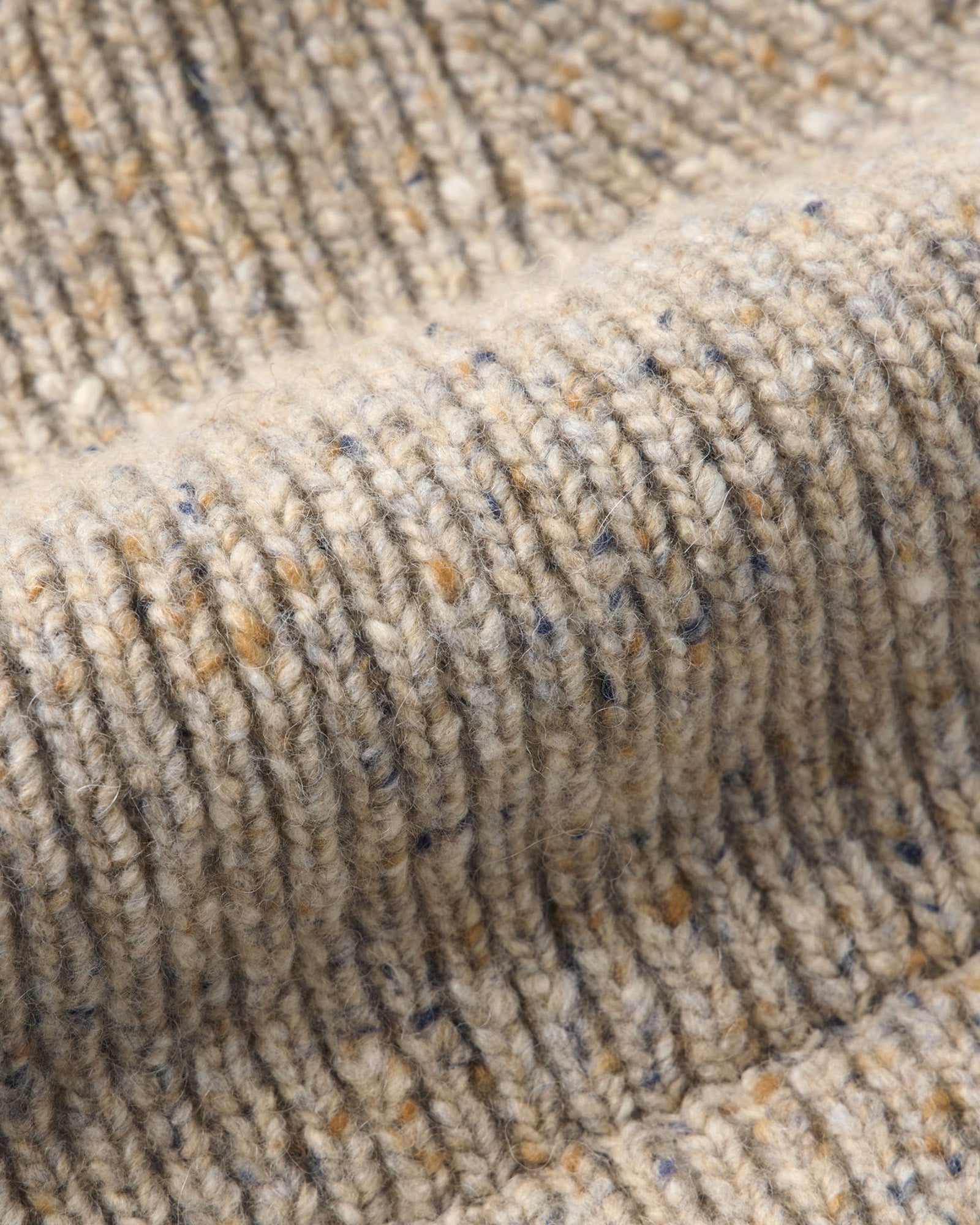 material shot of the fabric on The Seafarer Beanie in Natural Donegal, Accessories by Taylor Stitch