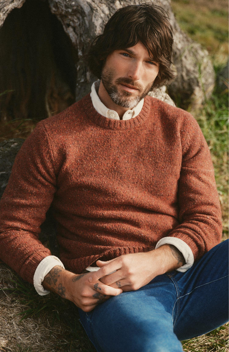 fit model posing in The Seafarer Crew Sweater in Ember Donegal