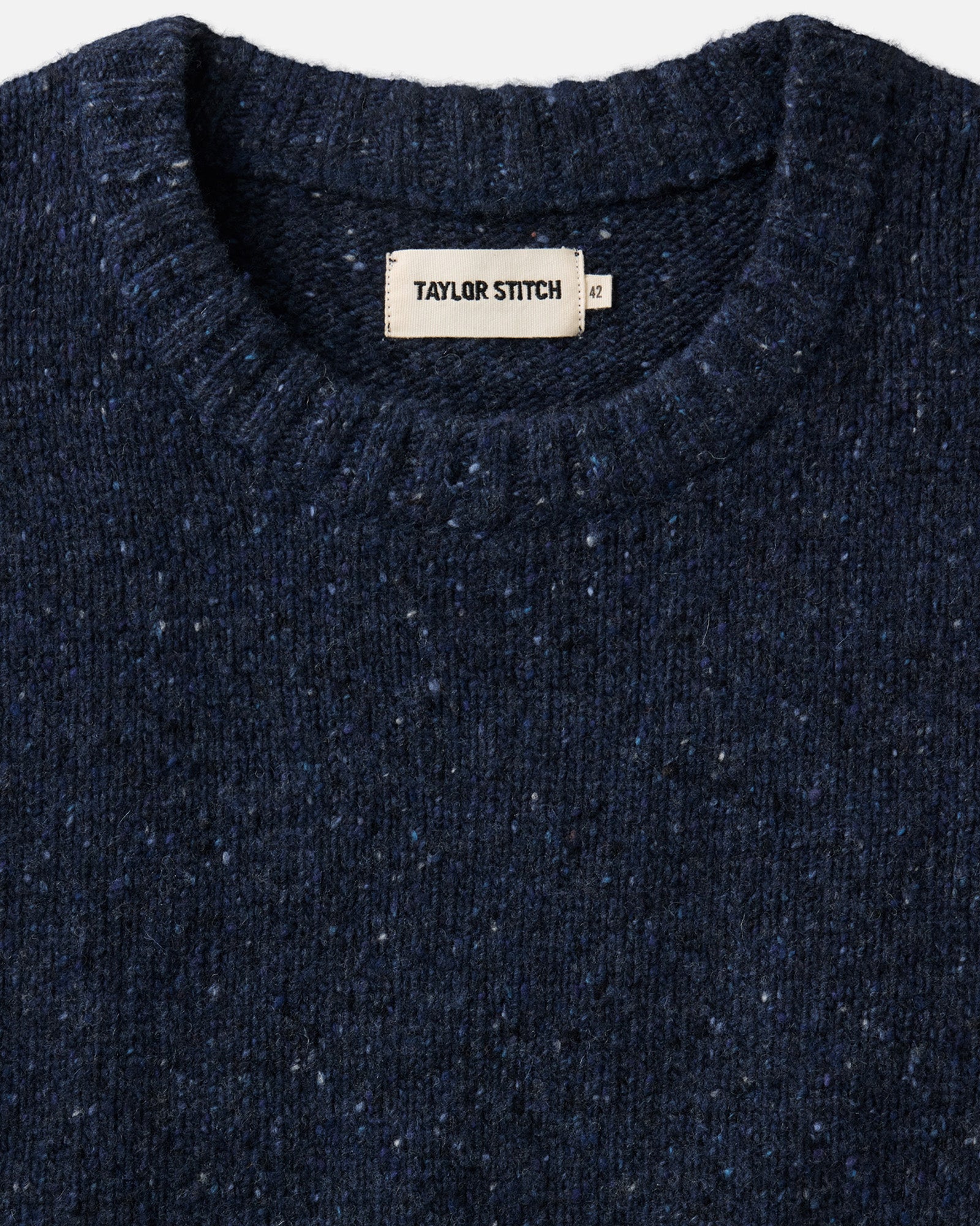 material shot of the collar on The Seafarer Crew Sweater in Atlantic Blue Donegal, Sweaters by Taylor Stitch