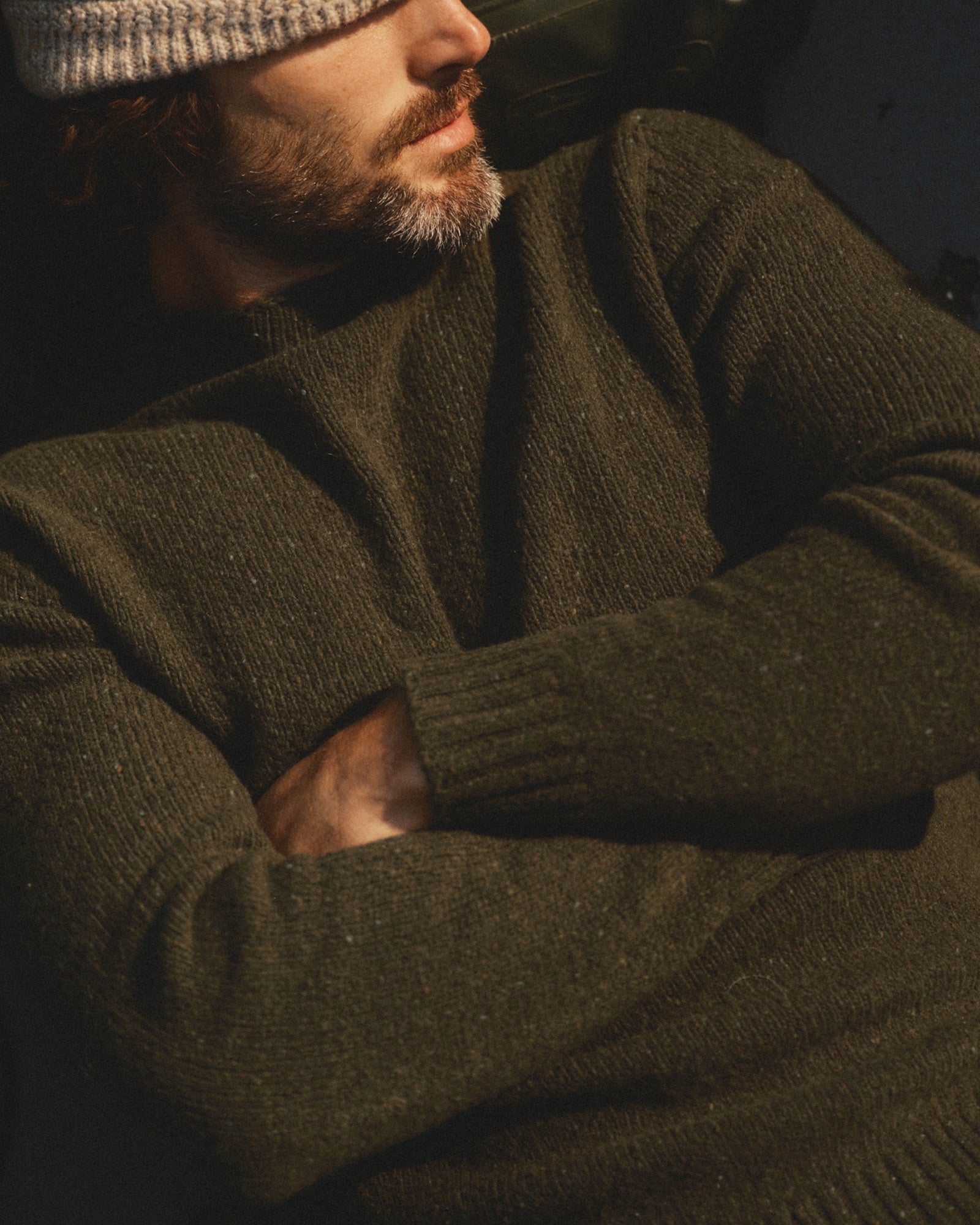 fit model showing off The Seafarer Rollneck Sweater in Olive Donegal, Sweaters by Taylor Stitch