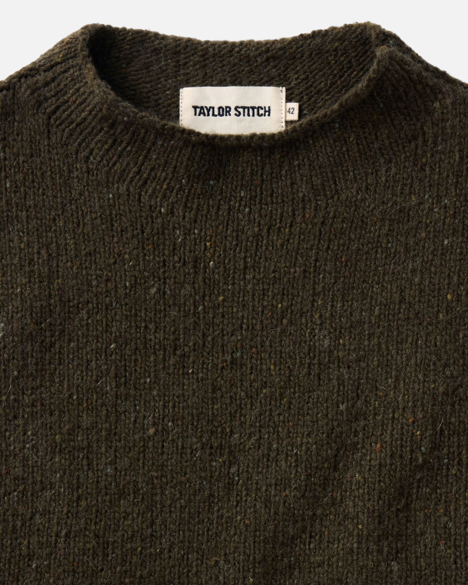 material shot of the collar on The Seafarer Rollneck Sweater in Olive Donegal, Sweaters by Taylor Stitch