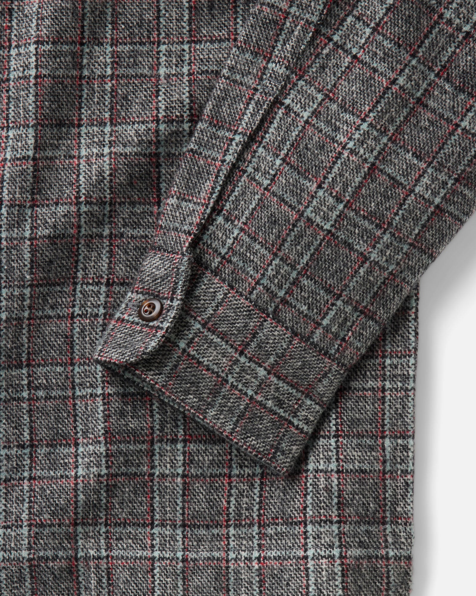 material shot of the sleeve on The Shore Shirt in Flint Check Wool, Wovens by Taylor Stitch