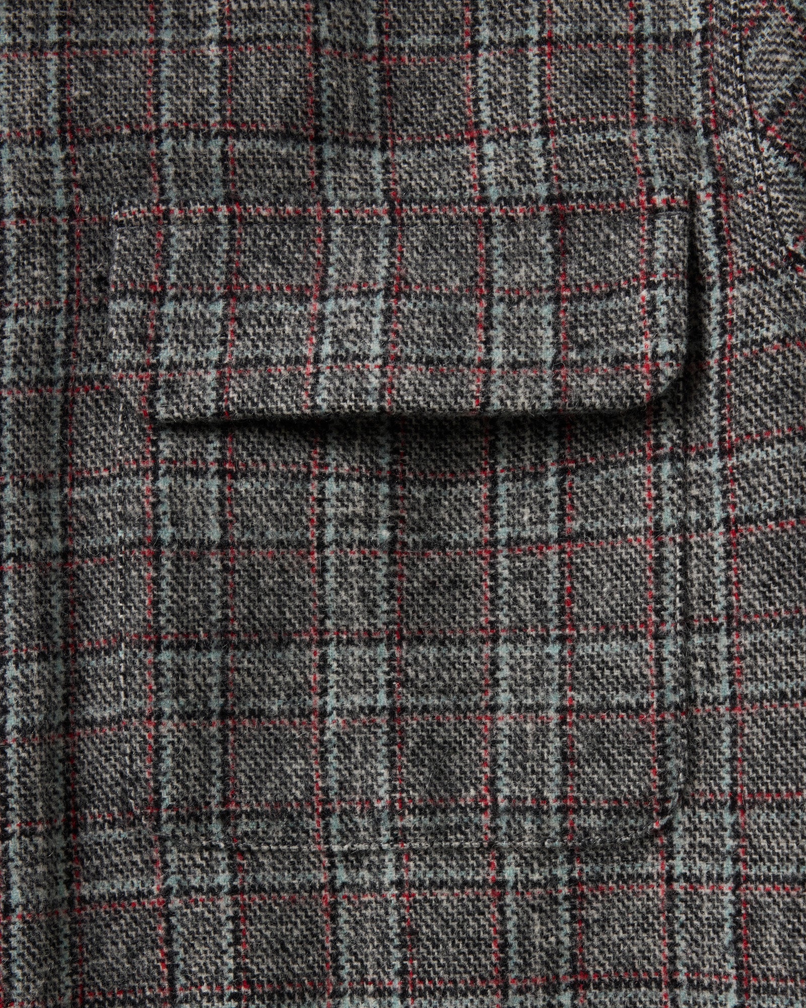 material shot of the pocket on The Shore Shirt in Flint Check Wool, Wovens by Taylor Stitch