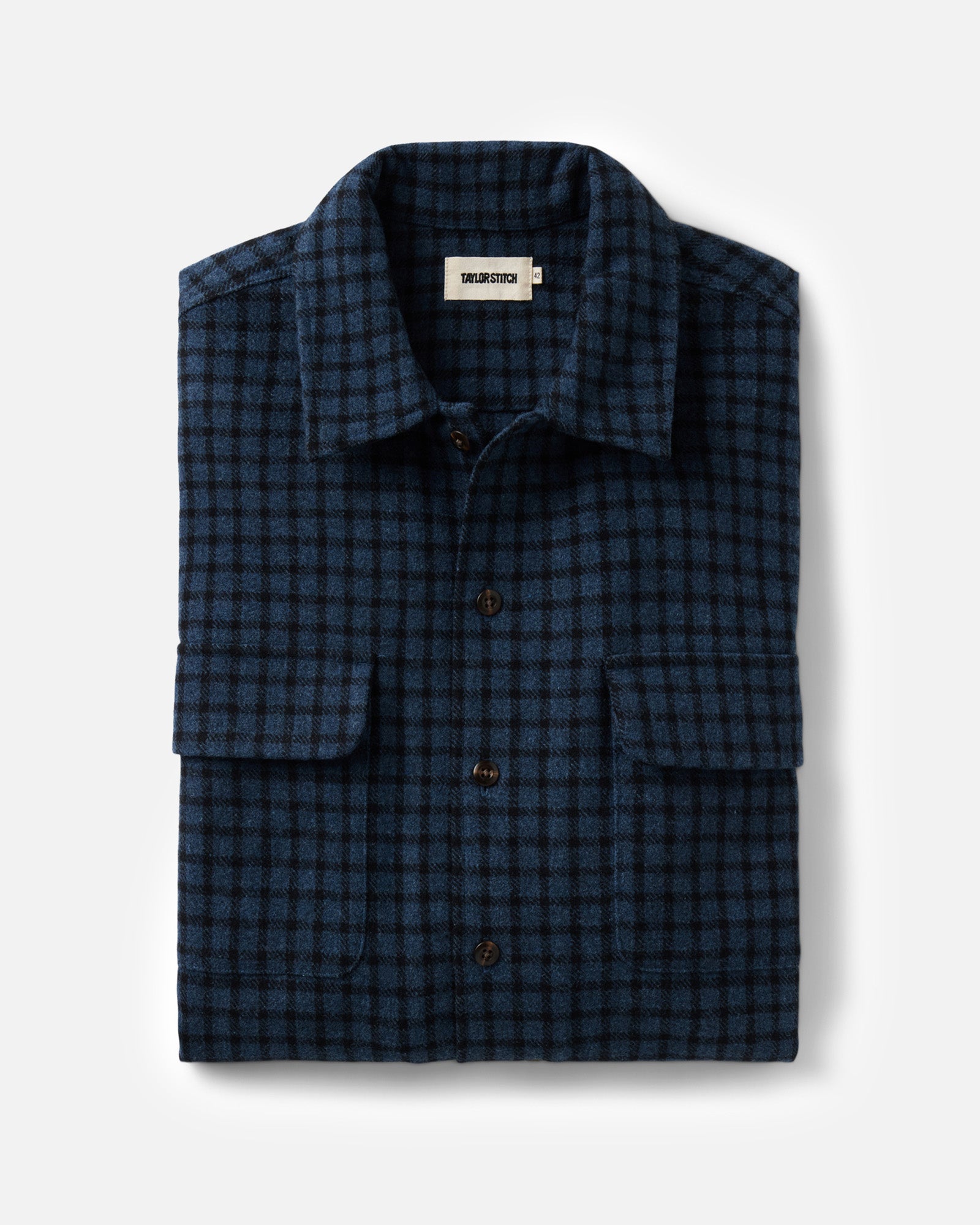 folded flatlay of The Shore Shirt in Midnight Check Wool, Wovens by Taylor Stitch