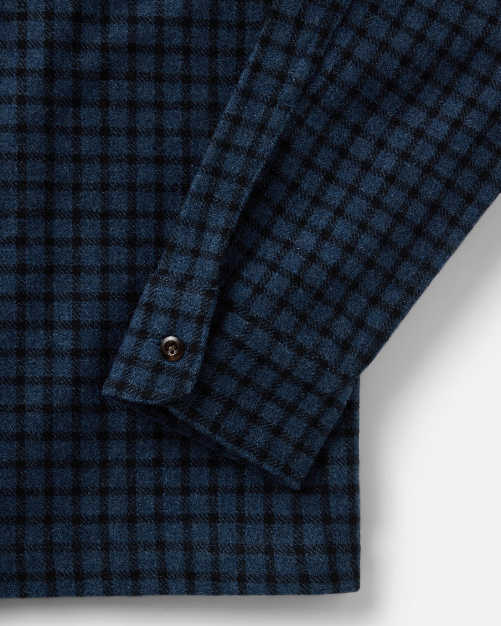 material shot of the sleeve on The Shore Shirt in Midnight Check Wool, Wovens by Taylor Stitch