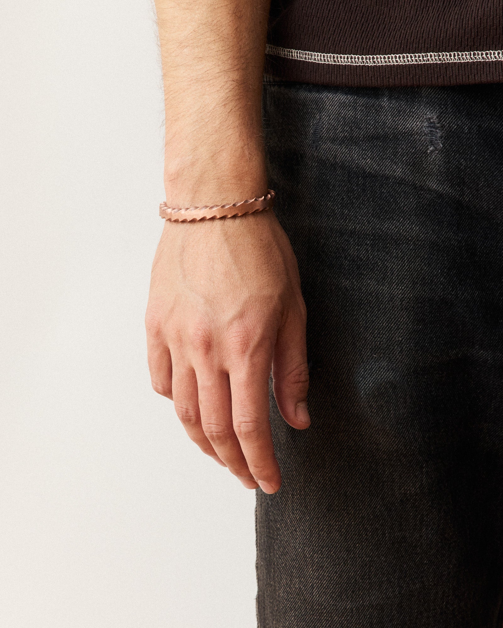 fit model showing off The Twisted Cuff in Copper, Accessories by Taylor Stitch