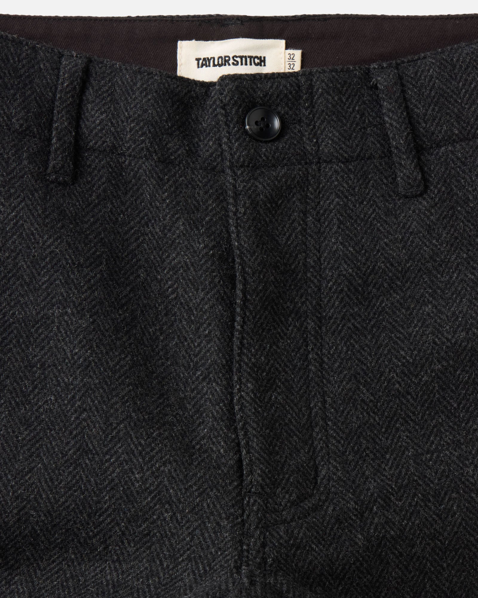 material shot of the waistband on The Carnegie Pant in Coal Herringbone Wool, Bottoms by Taylor Stitch