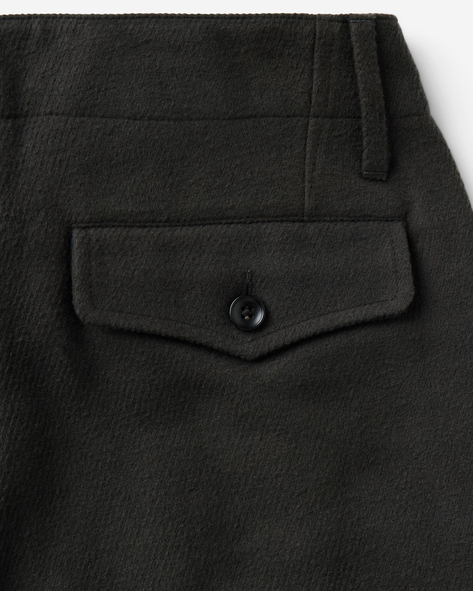material shot of the back pocket on The Carnegie Pant in Faded Black Washed Moleskin, Bottoms by Taylor Stitch