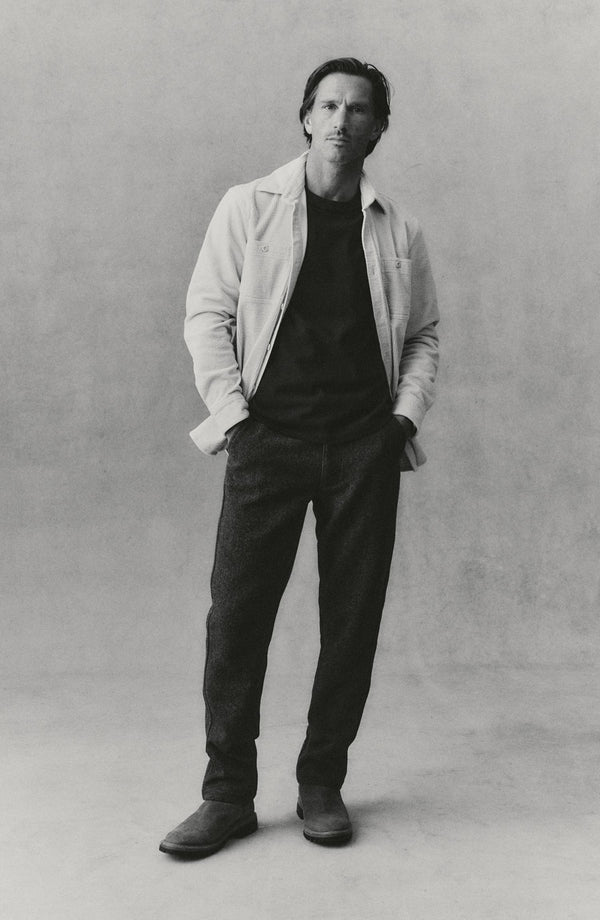 fit model showing off The Carnegie Pant in Walnut Herringbone Wool