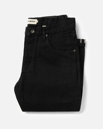 folded flatlay of The Democratic Jean in Rinsed Black Organic Selvedge