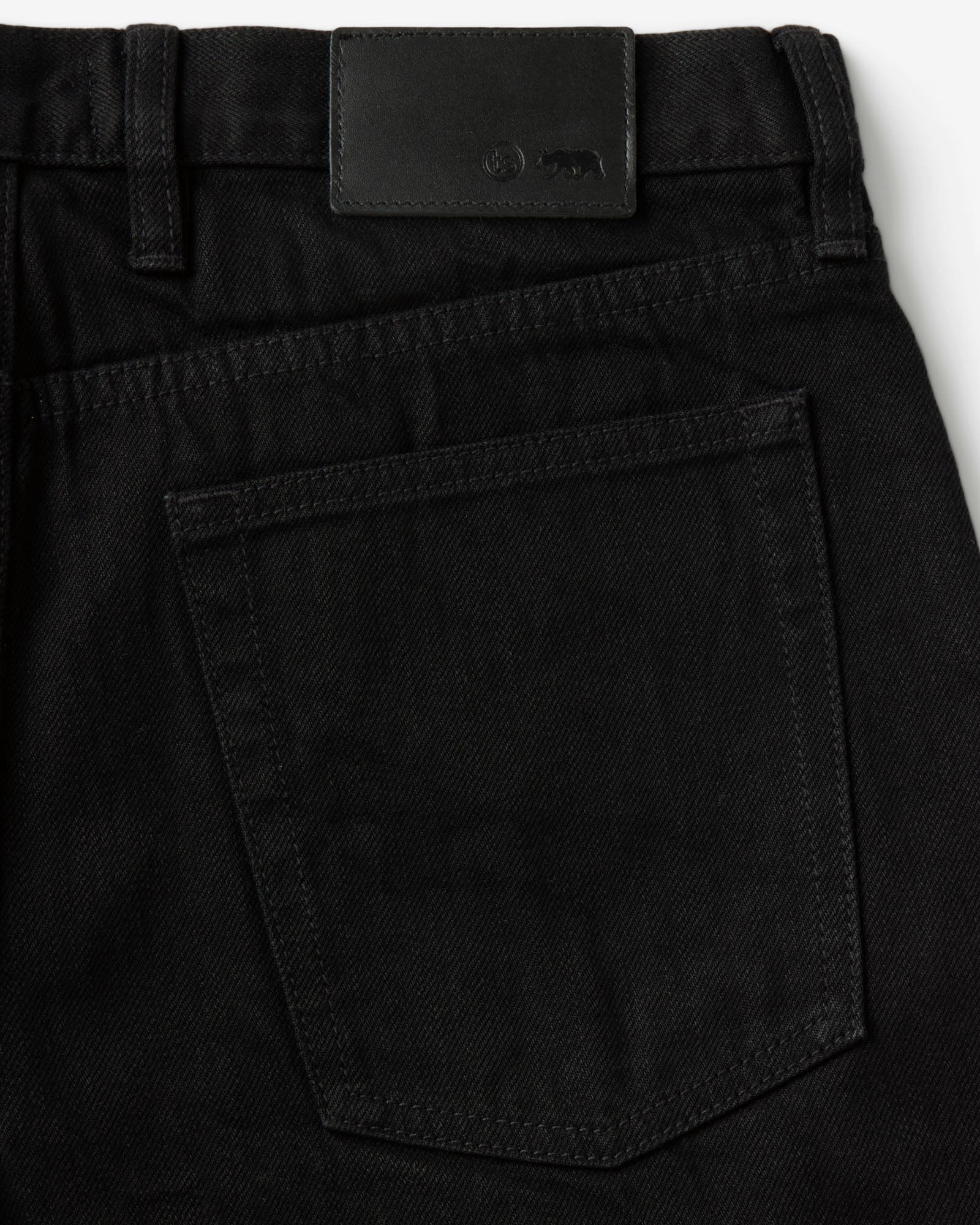 material shot of the back pocket on The Democratic Jean in Rinsed Black Organic Selvedge, Bottoms by Taylor Stitch