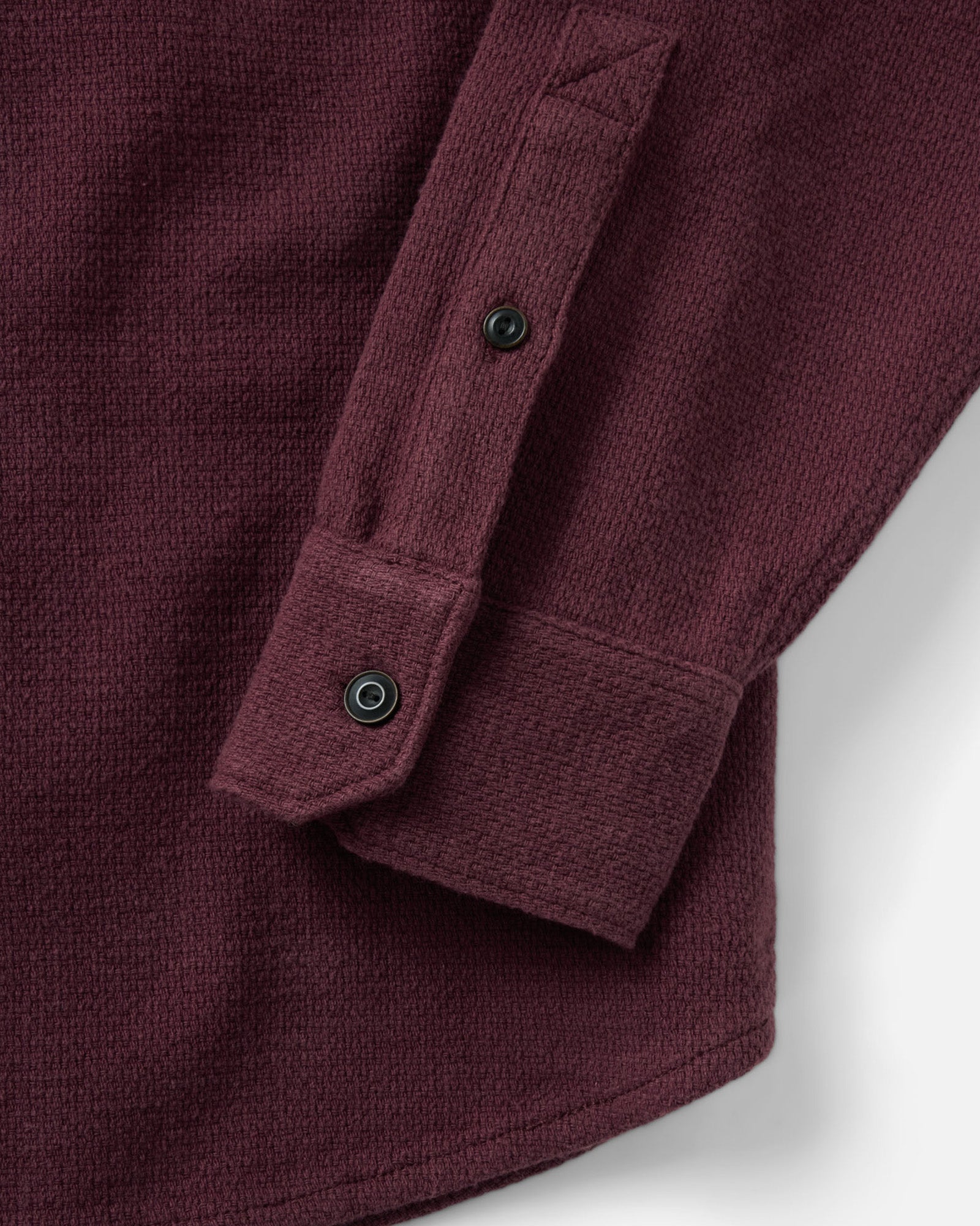 material shot of the sleeve on The Division Shirt in Black Cherry, Wovens by Taylor Stitch