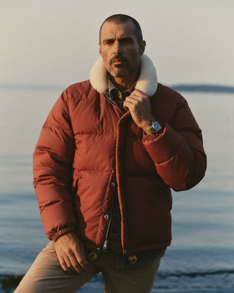 fit model showing off The Down Sweater Jacket in Brick Red Waxed Ripstop