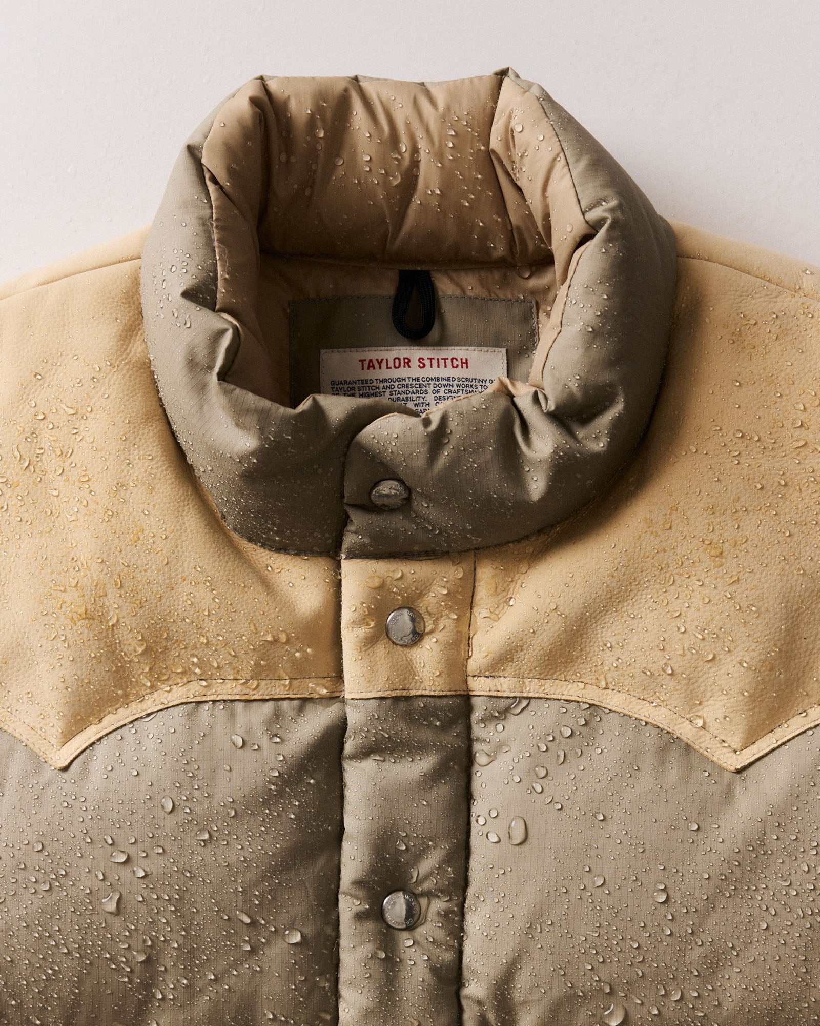 material shot of the collar on The Down Vest in Khaki Waxed Ripstop, Outerwear by Taylor Stitch