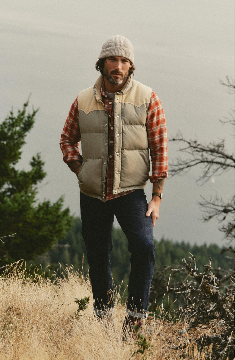 fit model posing in The Down Vest in Khaki Waxed Ripstop