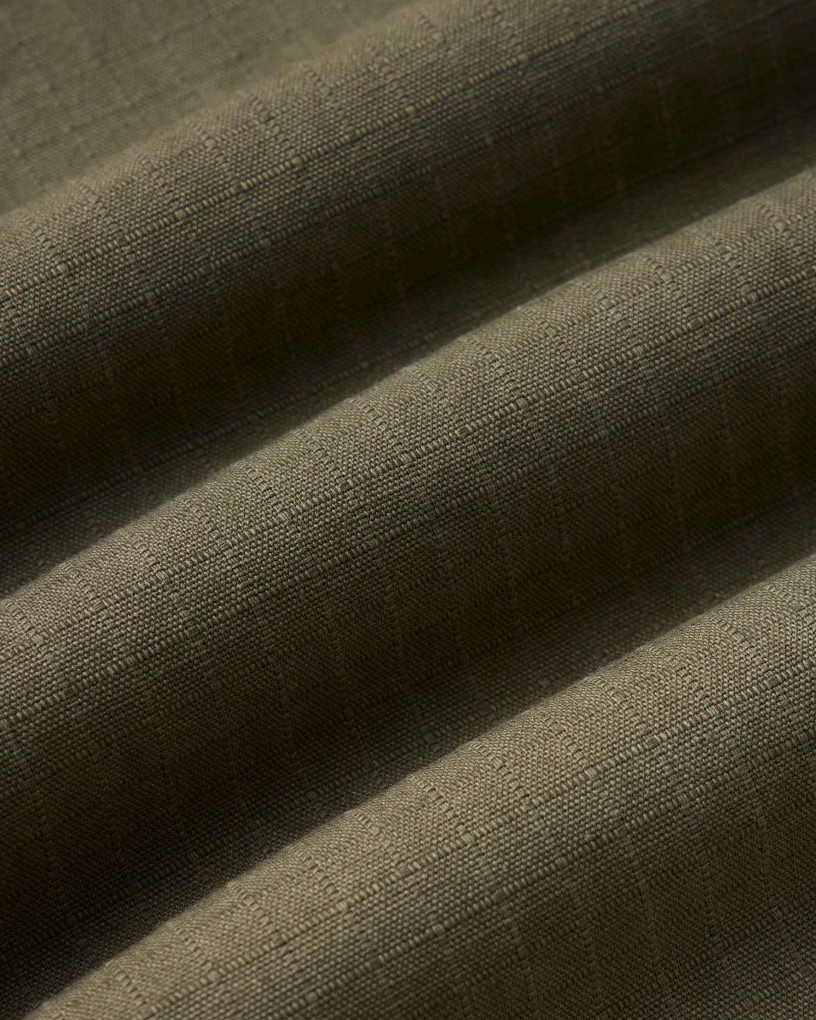 material shot of the fabric on The Field Jacket in Burnt Olive Ripstop, Outerwear by Taylor Stitch