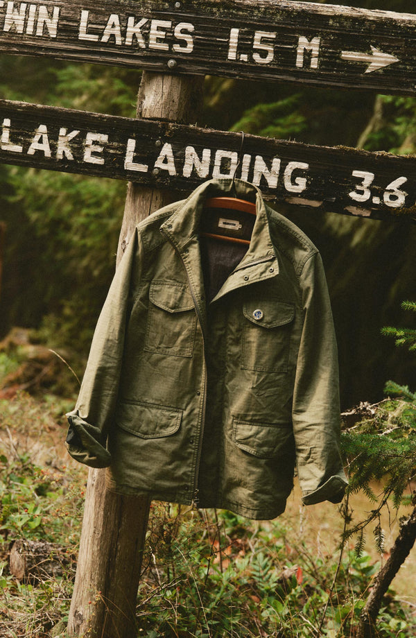 editorial image of The Field Jacket in Burnt Olive Ripstop hanging