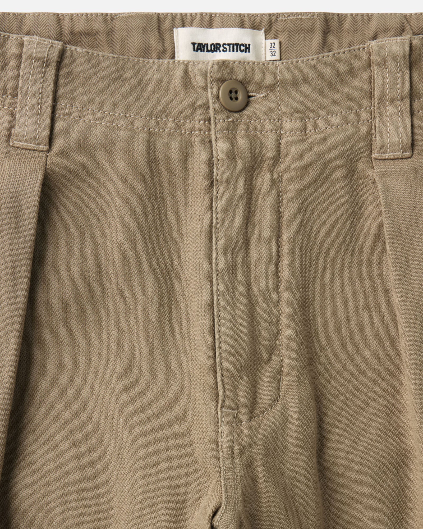 material shot of the waistband on The Forest Cargo Pant in Field Khaki Broken Twill, Bottoms by Taylor Stitch
