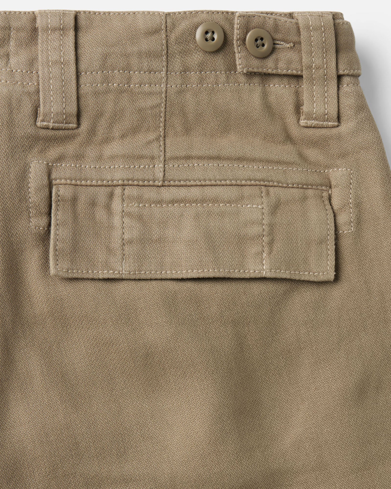 material shot of the back pocket on The Forest Cargo Pant in Field Khaki Broken Twill, Bottoms by Taylor Stitch