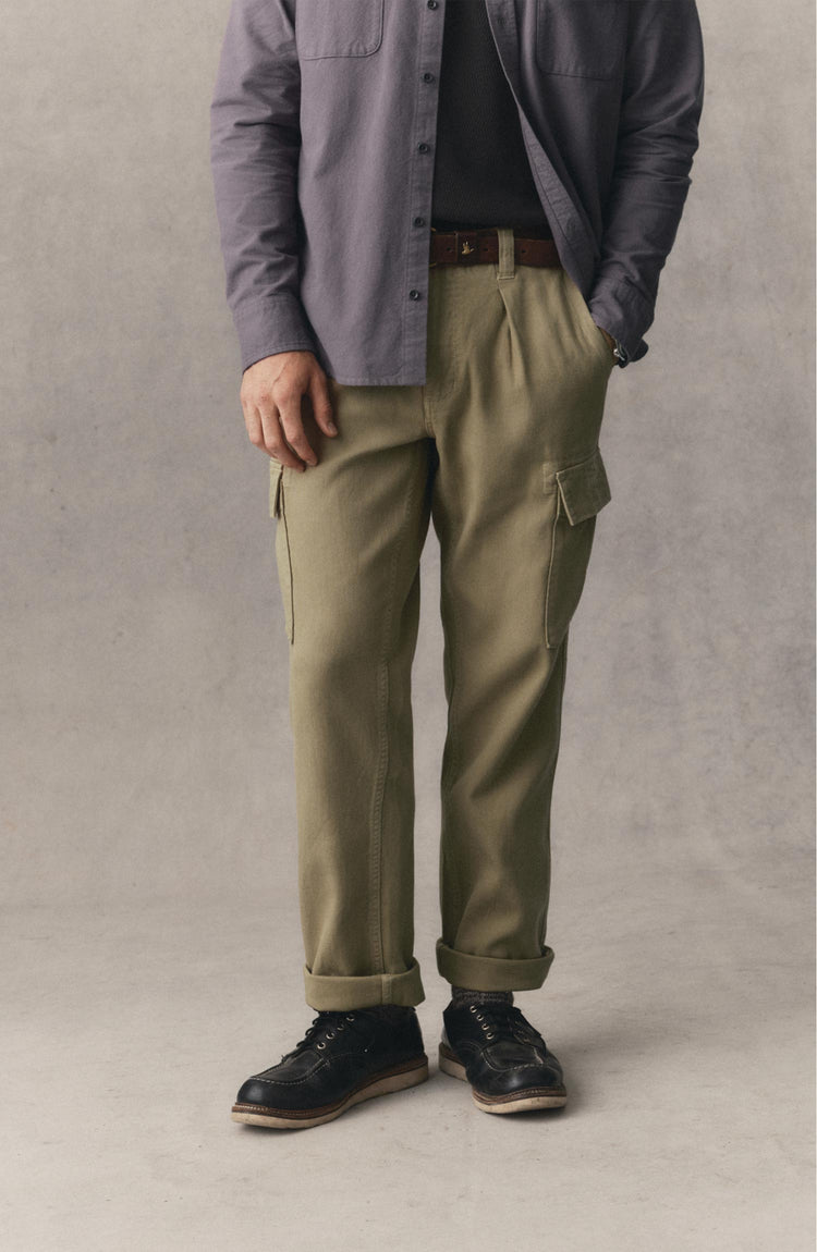 fit model posing in The Forest Cargo Pant in Field Khaki Broken Twill