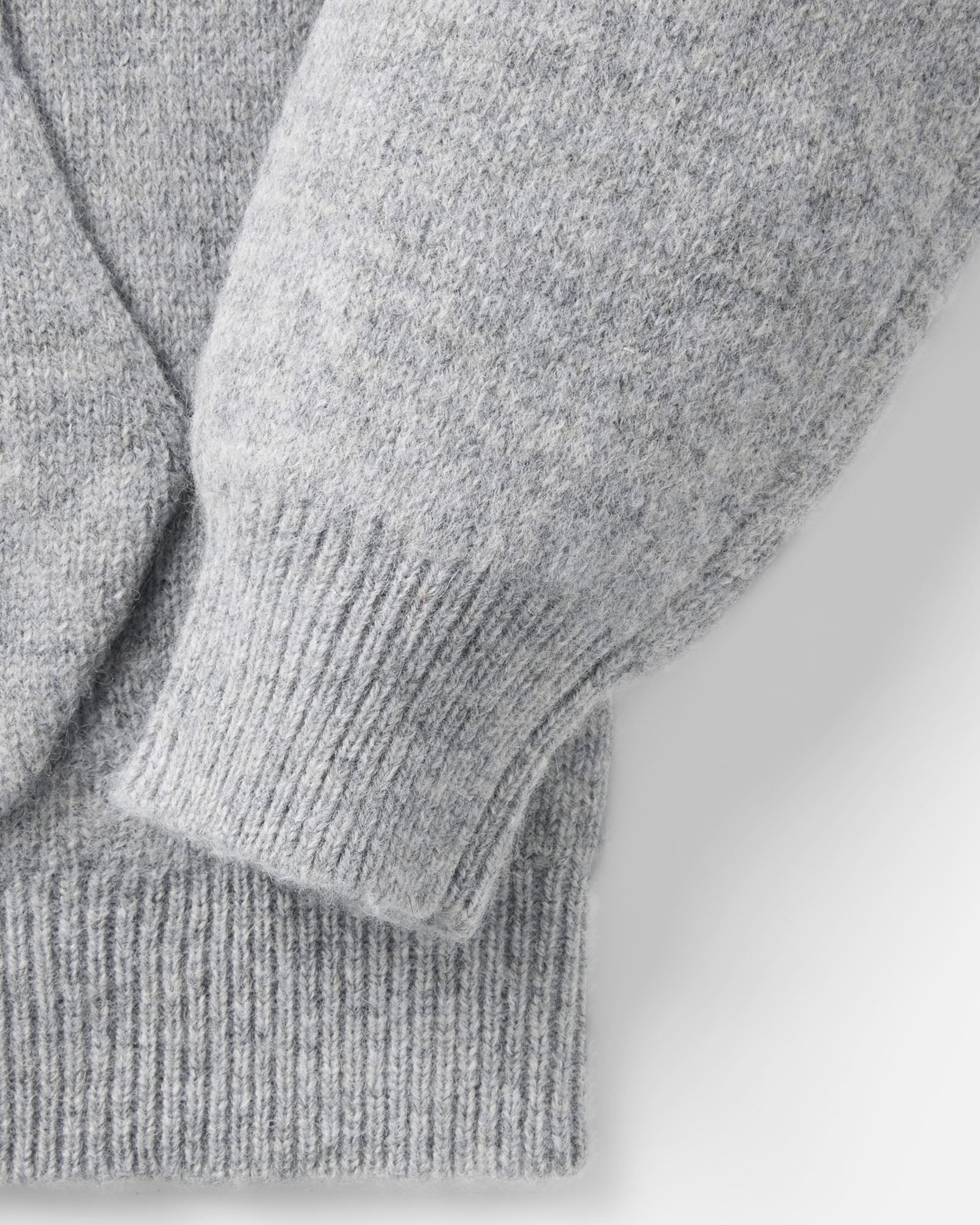 material shot of the sleeve on The Haven Sweater Hoodie in Heather Grey Wool, Sweaters by Taylor Stitch