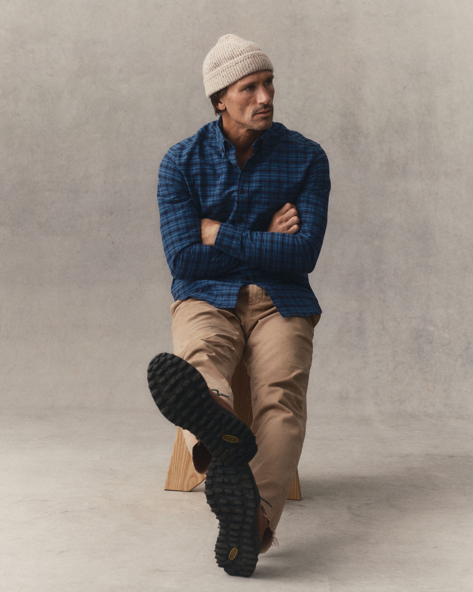 fit model sitting wearing The Jack in Crescent Plaid Oxford, Wovens by Taylor Stitch