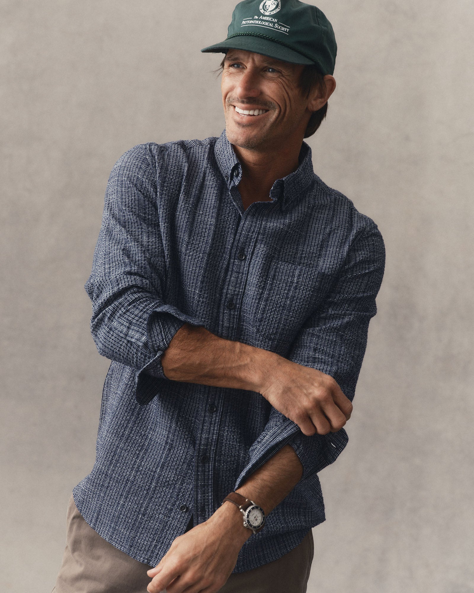 fit model adjusting the cuffs on The Jack in Indigo Basketweave Check, Wovens by Taylor Stitch