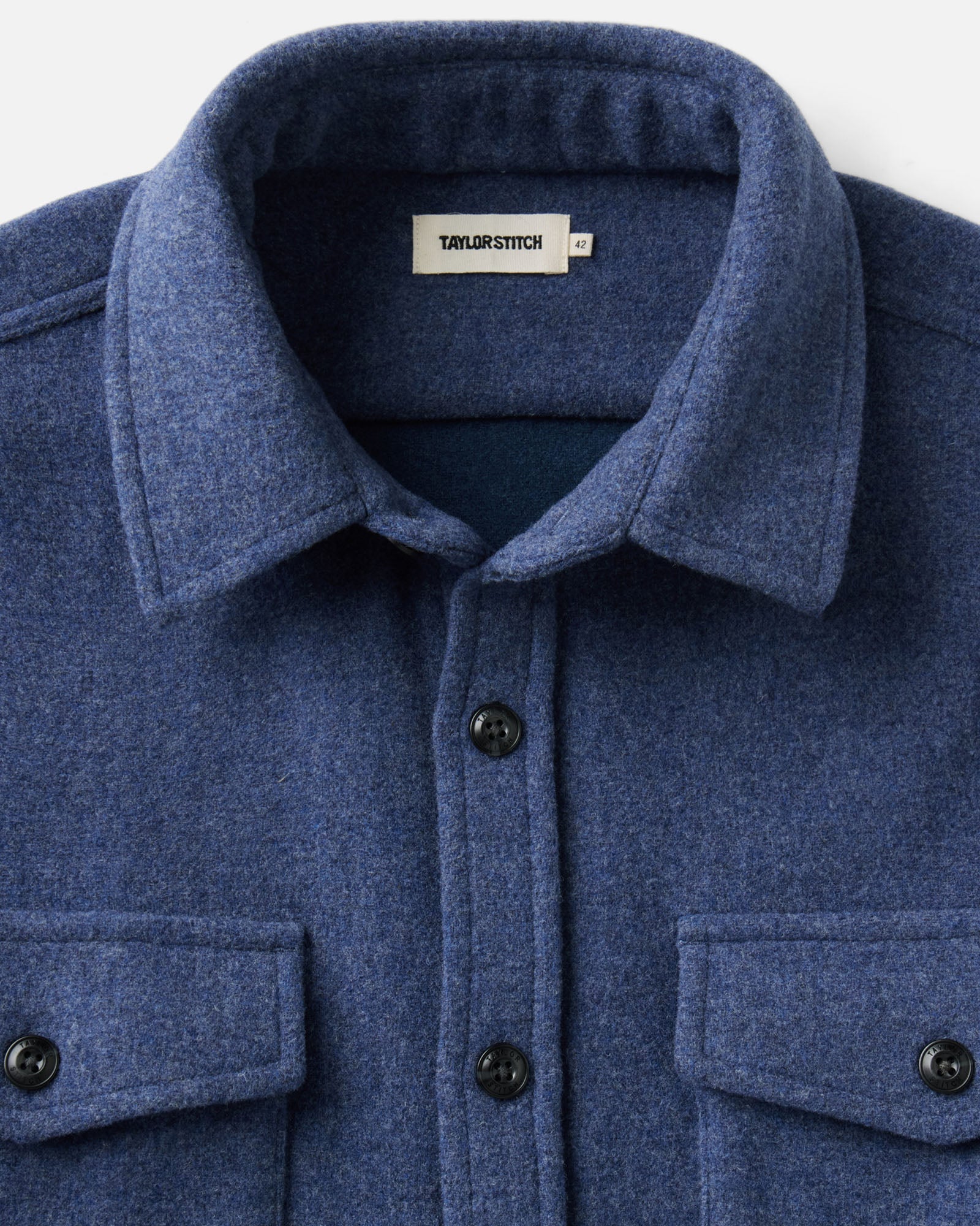 material shot of the collar on The Maritime Shirt Jacket in Heather Navy Wool, Outerwear by Taylor Stitch
