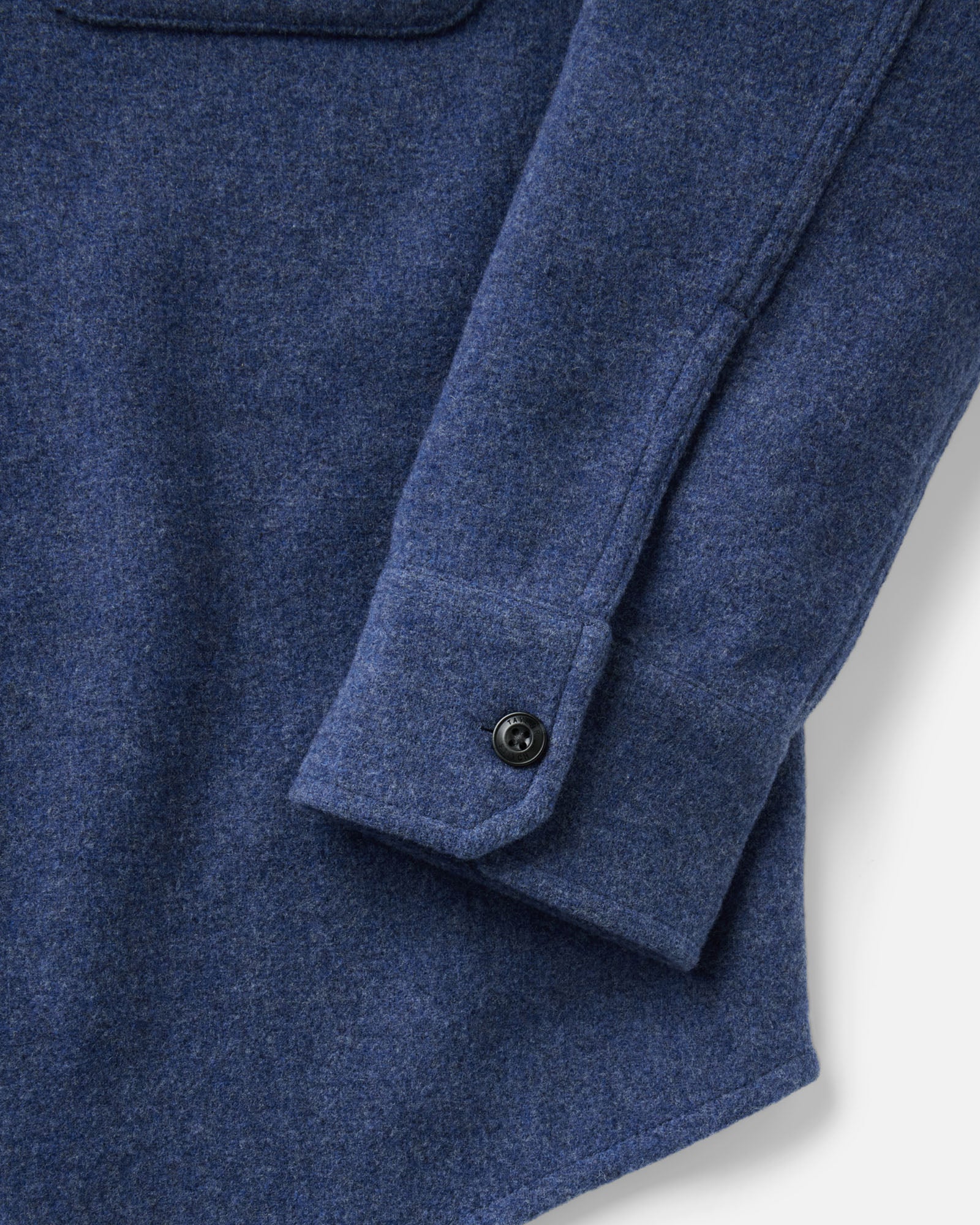 material shot of the sleeve on The Maritime Shirt Jacket in Heather Navy Wool, Outerwear by Taylor Stitch