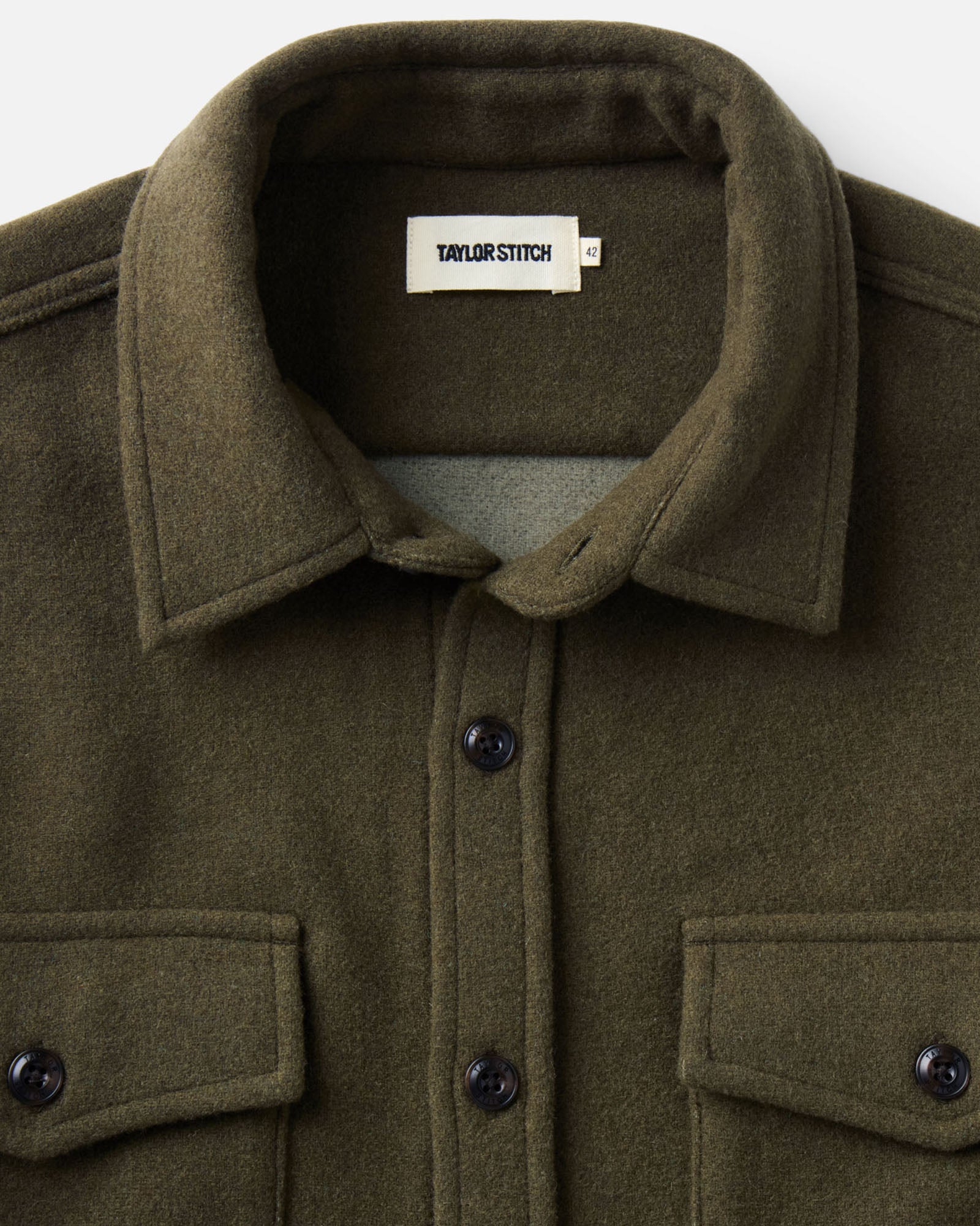 material shot of the collar on The Maritime Shirt Jacket in Heather Olive Wool, Outerwear by Taylor Stitch