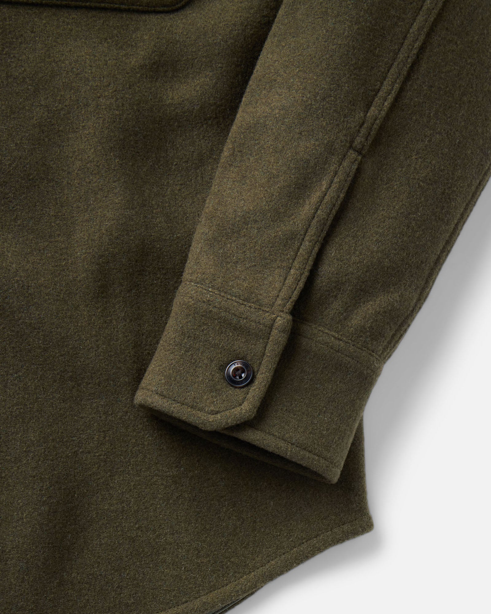 material shot of the sleeve on The Maritime Shirt Jacket in Heather Olive Wool, Outerwear by Taylor Stitch
