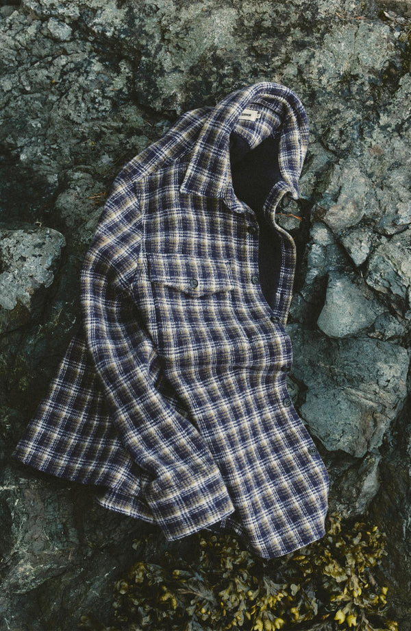 editorial flatlay of The Maritime Shirt Jacket in Navy Shadow Plaid Wool