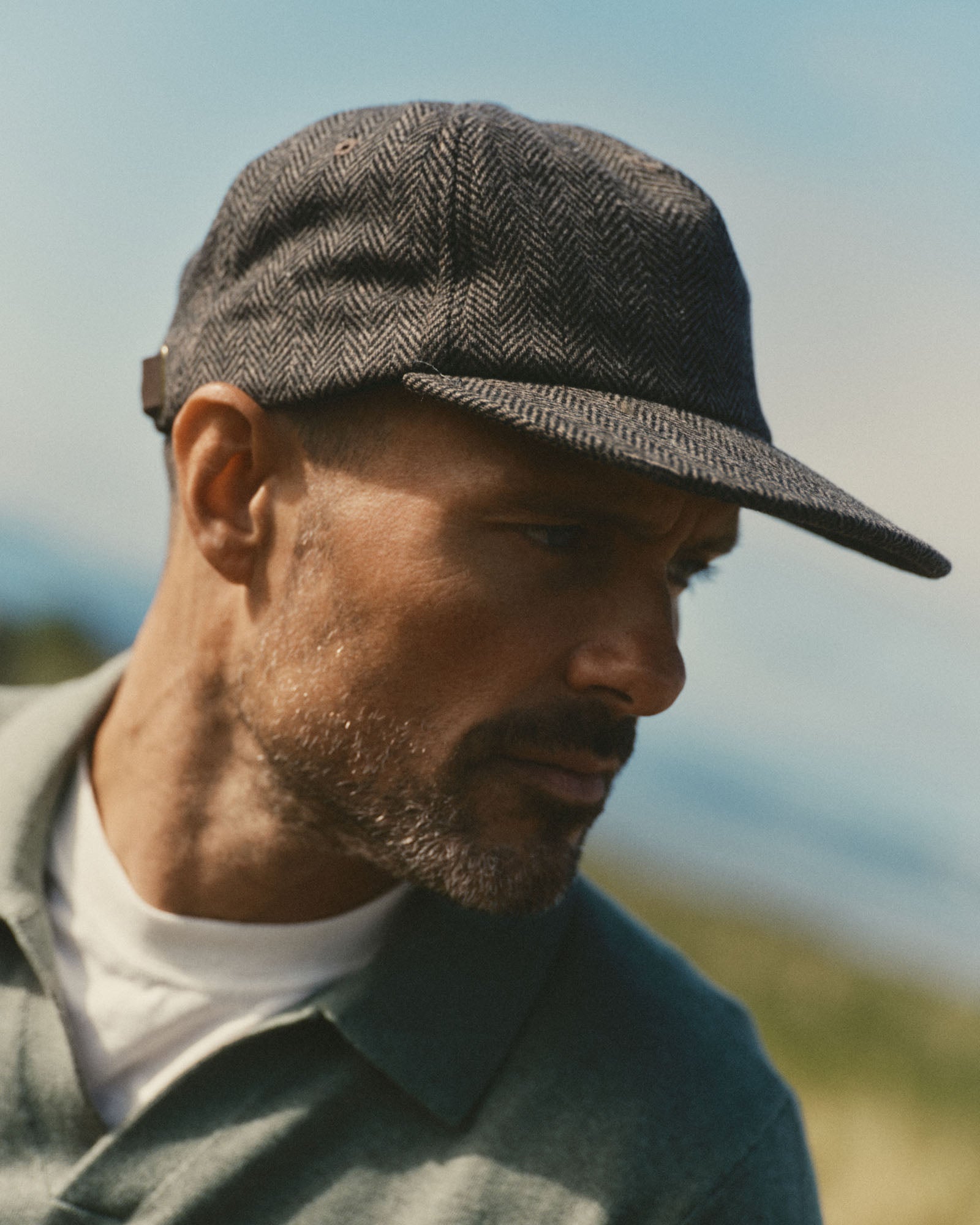fit model showing off The Mercer Cap in Walnut Herringbone Wool, Accessories by Taylor Stitch
