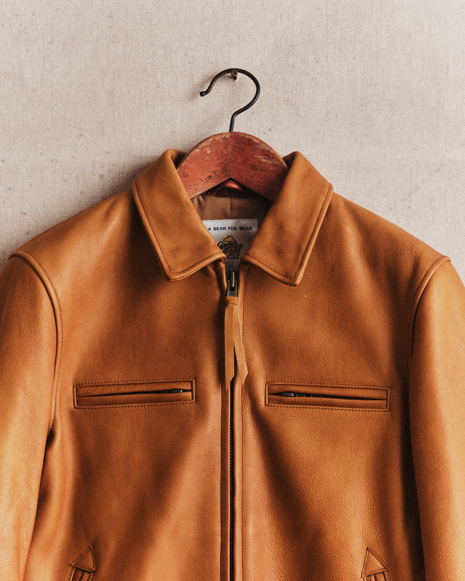 hanging shot of Moto Jacket in Whiskey Steerhide collar, Outerwear by Taylor Stitch