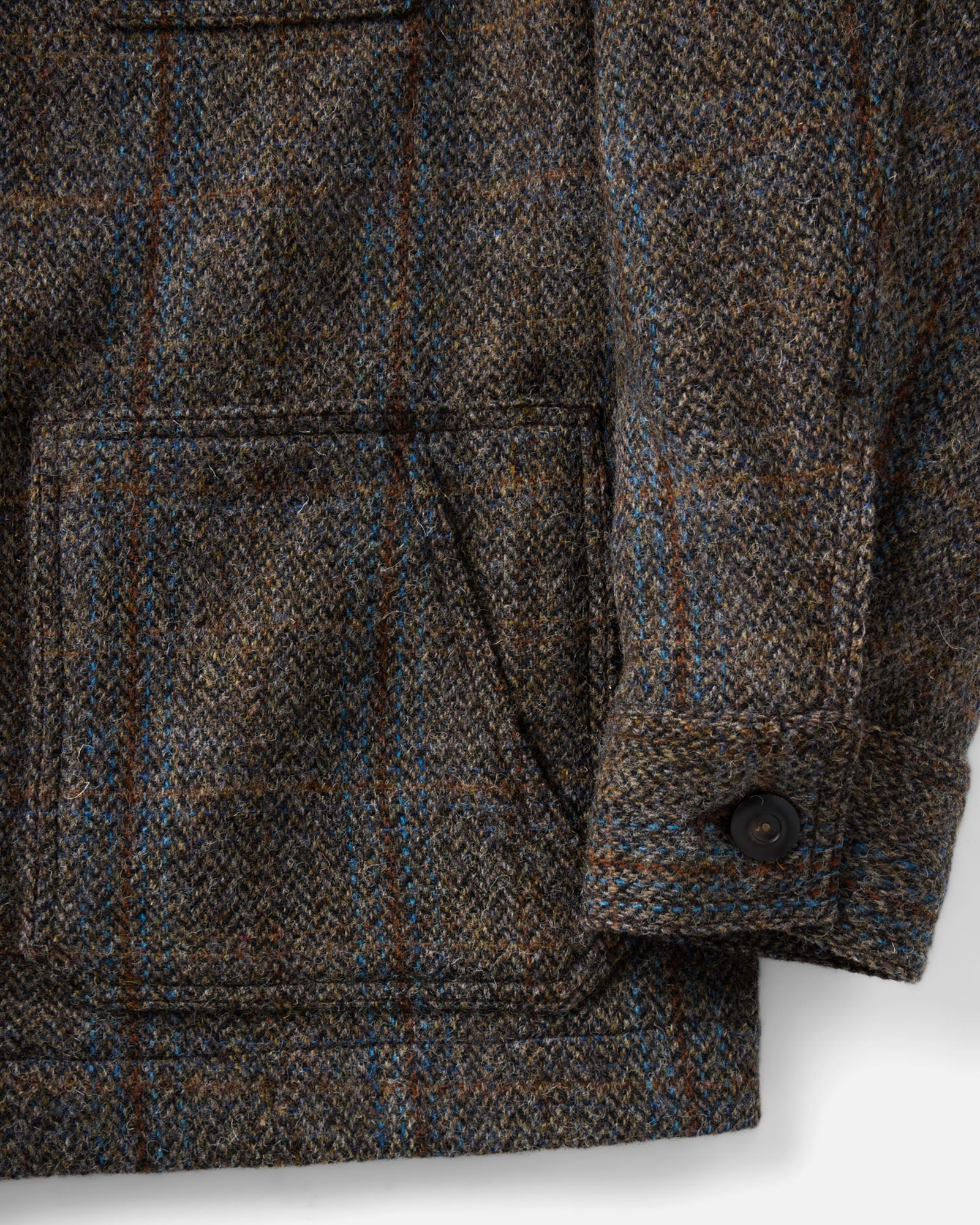 material shot of the sleeve on The Ojai Jacket in Rust Check Harris Tweed Wool, Outerwear by Taylor Stitch