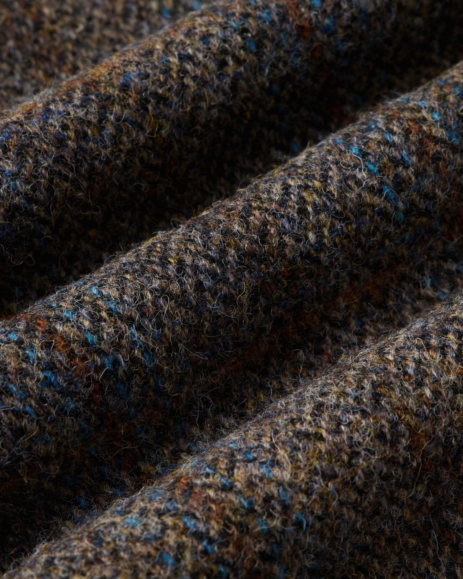 material shot of the fabric on The Ojai Jacket in Rust Check Harris Tweed Wool, Outerwear by Taylor Stitch