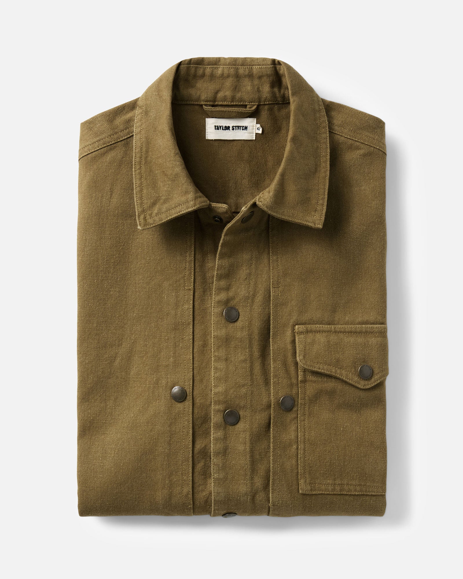 folded flatlay of The Pacific Overshirt in Bay Leaf Hemp Canvas, Wovens by Taylor Stitch