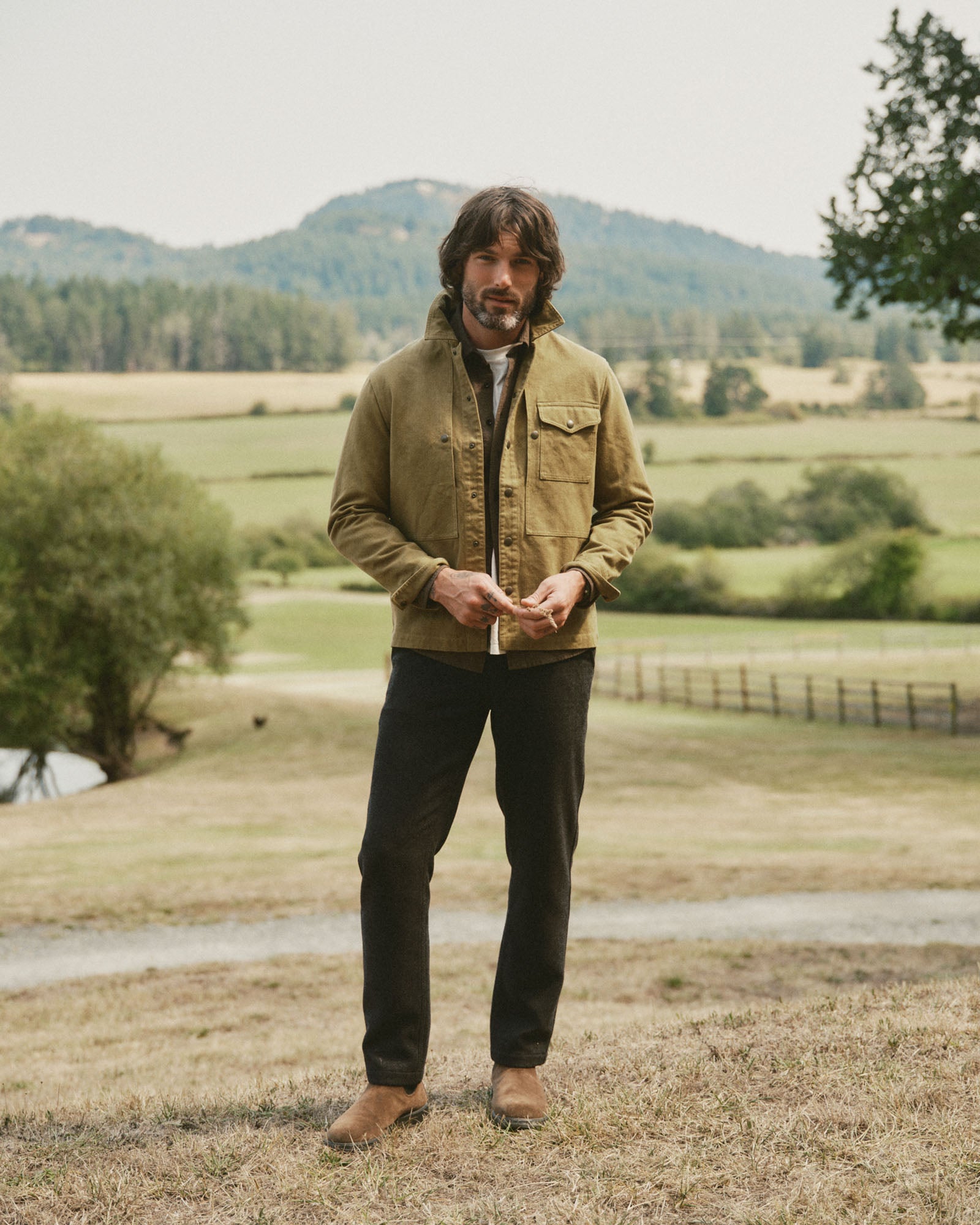 fit model showing off The Pacific Overshirt in Bay Leaf Hemp Canvas, Wovens by Taylor Stitch