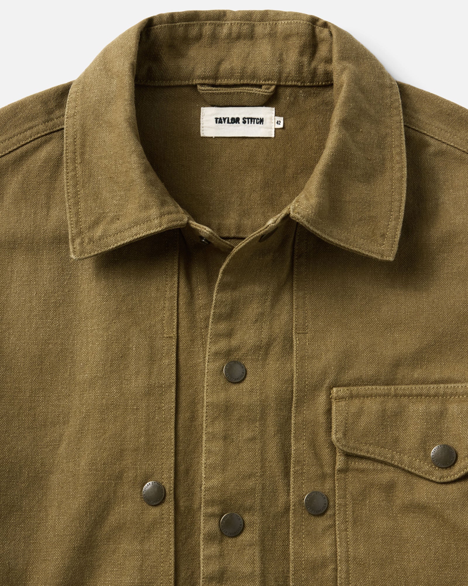 material shot of the collar of The Pacific Overshirt in Bay Leaf Hemp Canvas, Wovens by Taylor Stitch