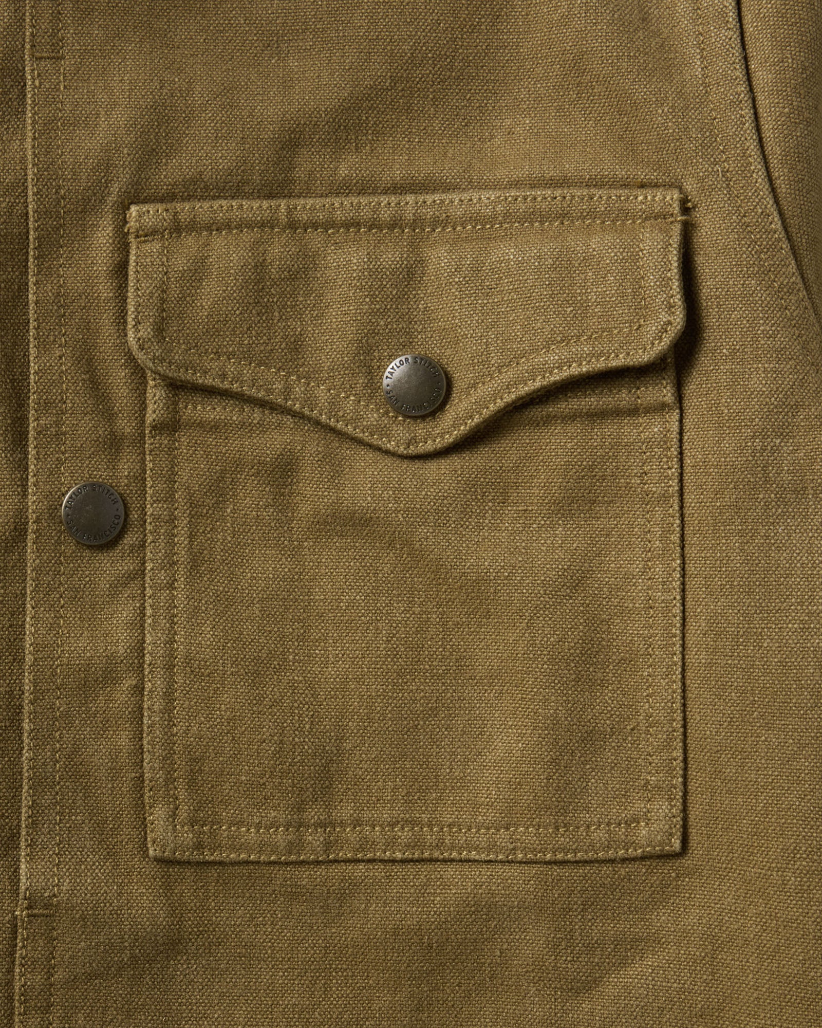 material shot of the pocket on The Pacific Overshirt in Bay Leaf Hemp Canvas, Wovens by Taylor Stitch